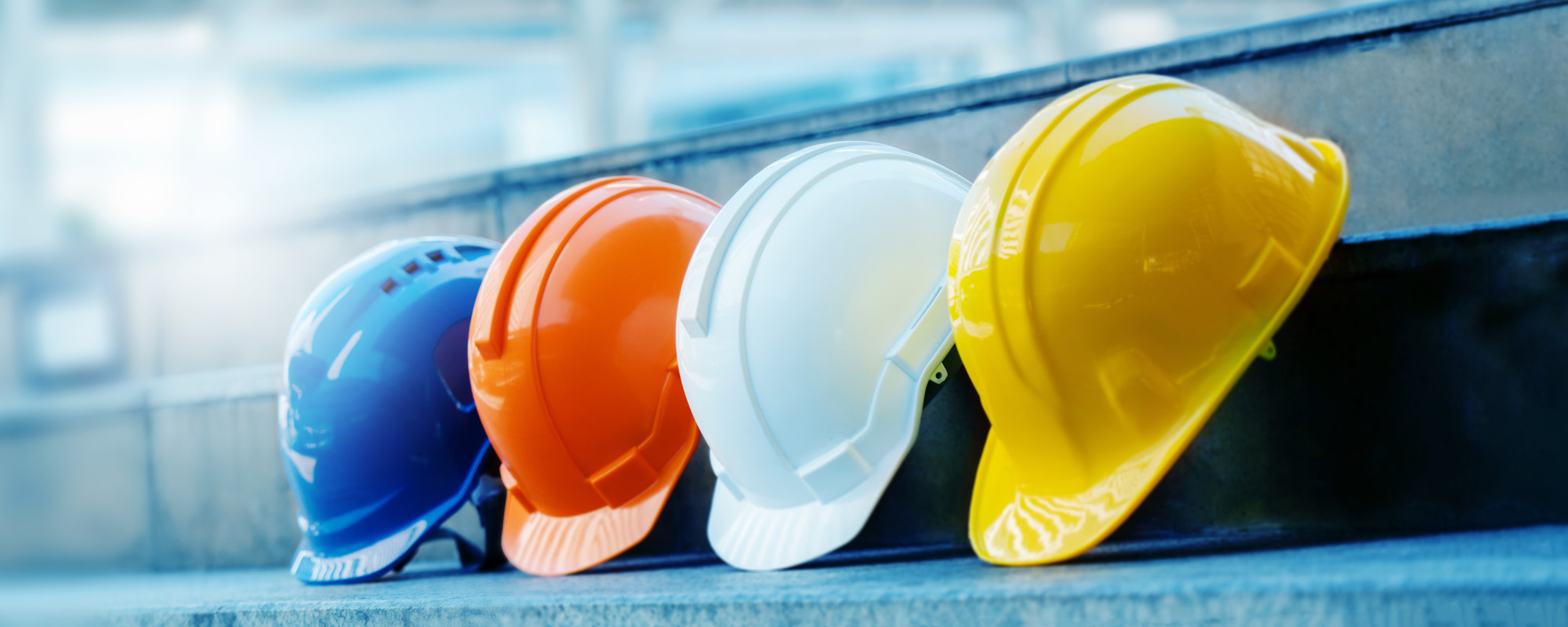 Multicolored Safety Construction Worker Hats. Teamwork of the construction team must have quality